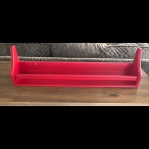 Red pottery barn book shelf